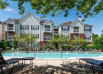 Governor's Green resort-style pool and apartment exterior